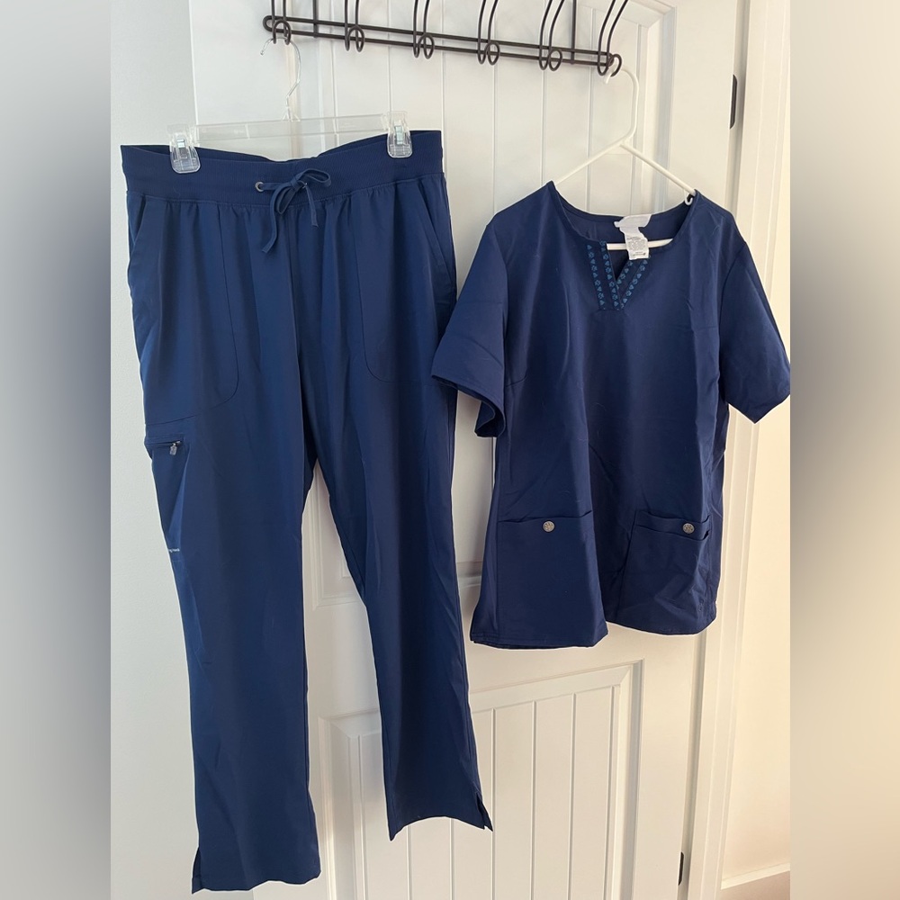 Navy blue, veterinary scrub set. Worn only as a veterinary receptionist .